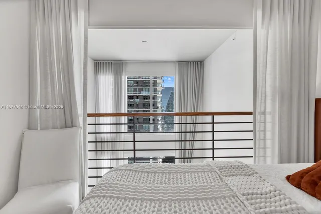 a view of a living room and a window