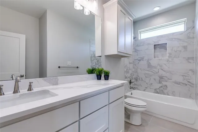 a group of people sitting in living room