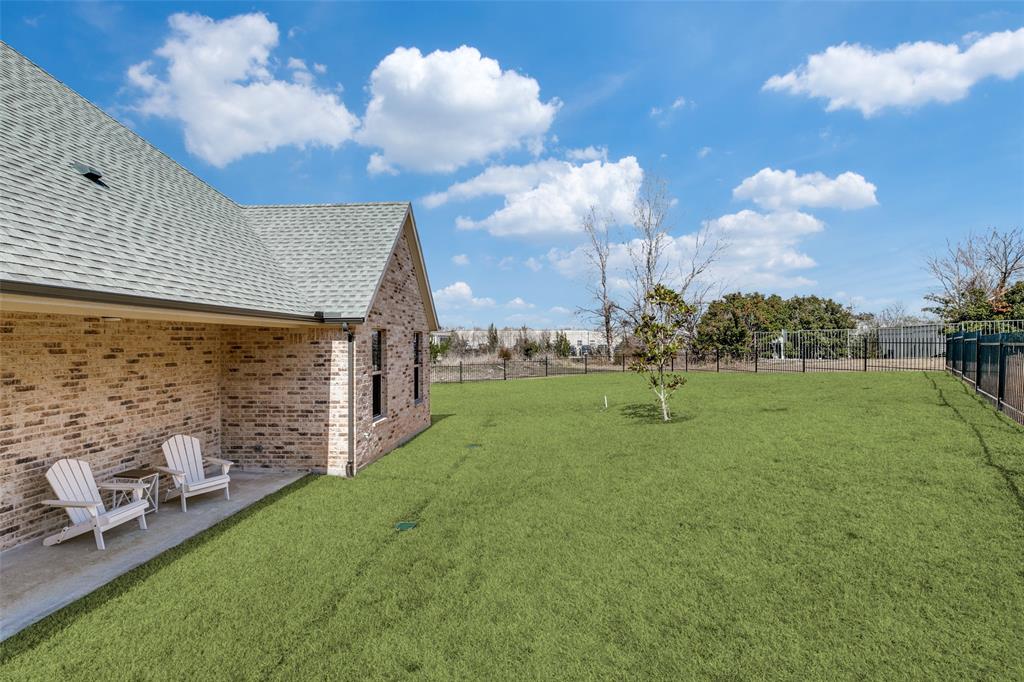 635 Community Lane Rockwall, TX 75087 - Photo 24 of 25 a view of a garden