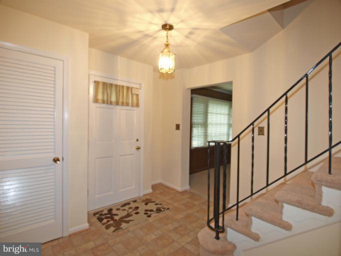 1613 Arbor View Road Silver Spring, MD 20902 - Photo 22 of 25 a view of a hallway view with staircase