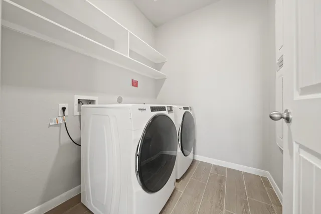 a utility room with dryer and washer