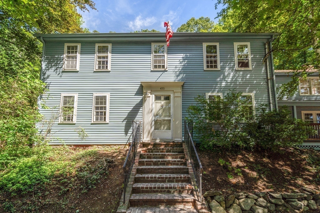 495 Edmands Road Framingham, MA 01701 - Photo 1 of 39 a front view of a house with a yard