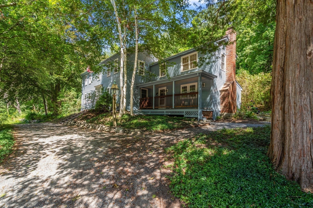 495 Edmands Road Framingham, MA 01701 - Photo 2 of 39 front view of a house with a tree