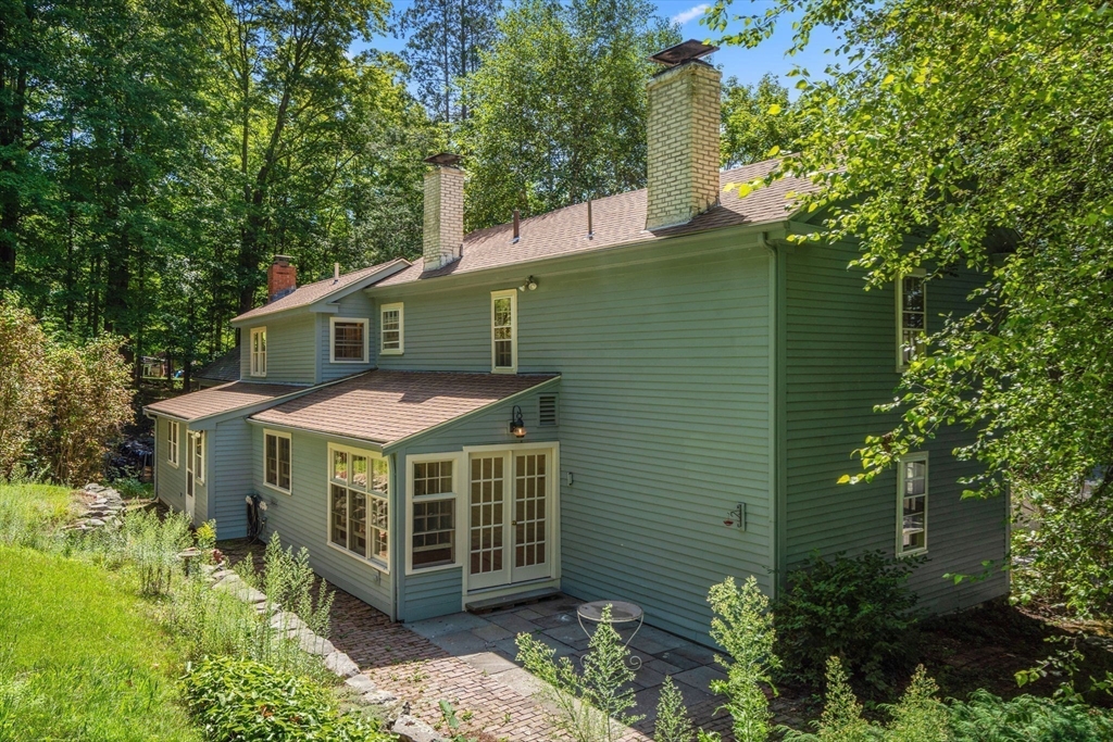 495 Edmands Road Framingham, MA 01701 - Photo 6 of 39 a view of a house with a yard balcony and plants