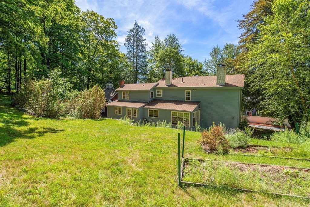495 Edmands Road Framingham, MA 01701 - Photo 10 of 39 front view of a house with a yard
