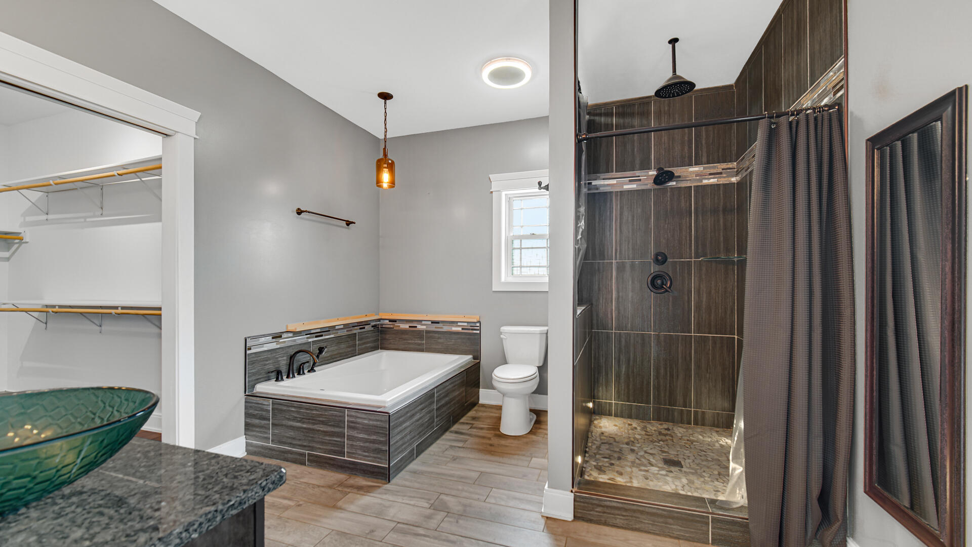 10427 North 600th Street West Demotte, IN 46310 - Photo 12 of 26 a bathroom with a sink and a mirror