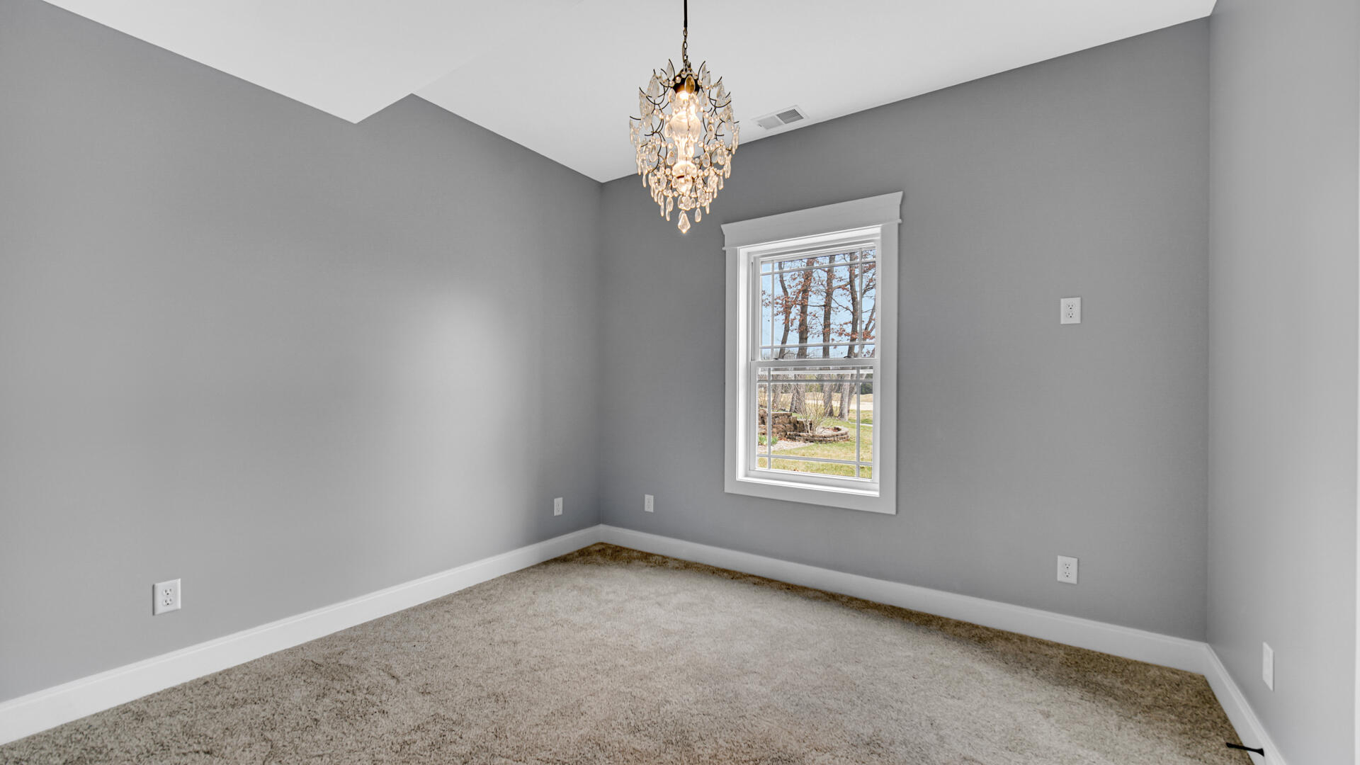 10427 North 600th Street West Demotte, IN 46310 - Photo 23 of 26 a view of an empty room with a window