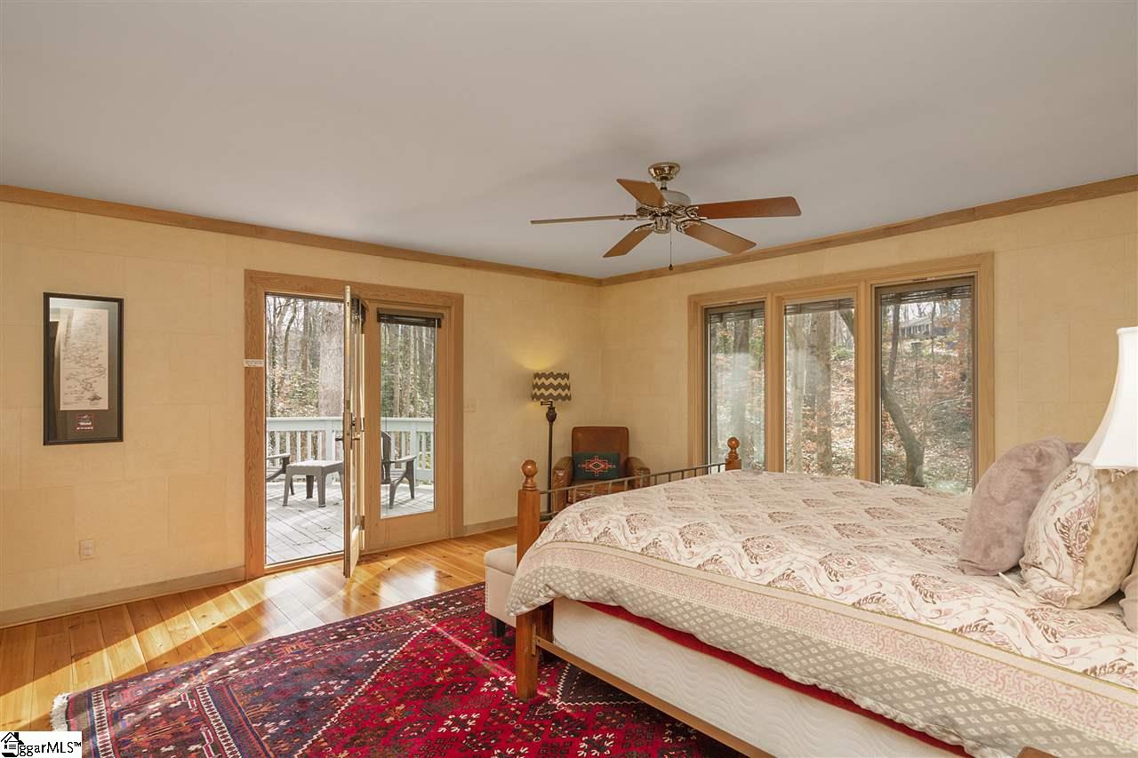 1111 Wembley Road Greenville, SC 29607 - Photo 14 of 35 Main Level, Heart of Pine Floors, Private Deck, Overlooks creek and pure privacy, double walk-in closets