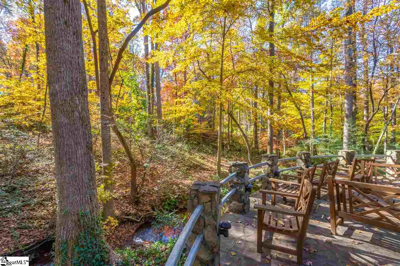 1111 Wembley Road Greenville, SC 29607 - Photo 27 of 35 Stone patio overlooking creek and 1.18 acre lot