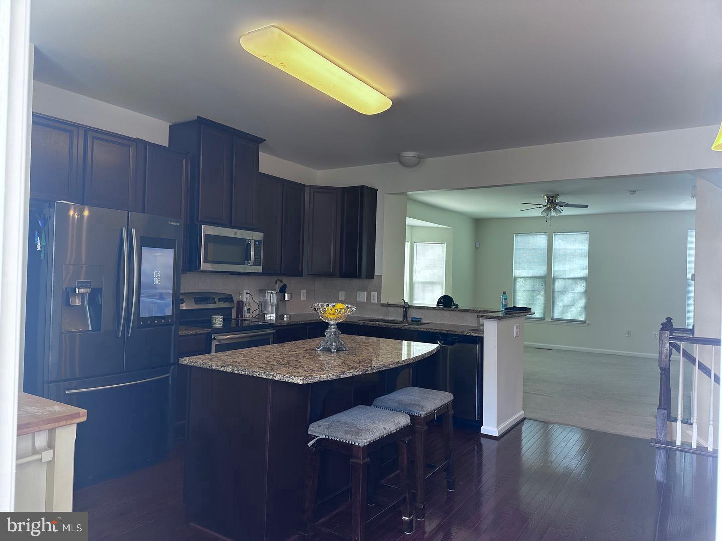 313 Brenton Road, Unit 40 Fredericksburg, VA 22405 - Photo 12 of 18 Modern kitchen with open layout charm.