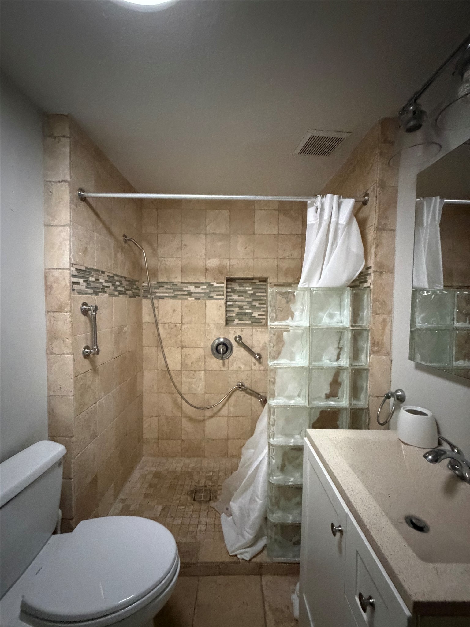 703 76th Street Houston, TX 77012 - Photo 17 of 23 a bathroom with a sink toilet and shower