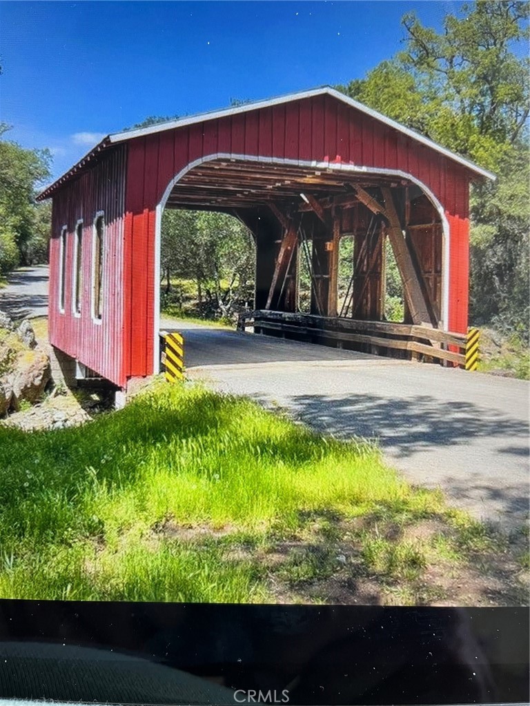 1484 Oregon Gulch Road Oroville, CA 95965 - Photo 2 of 19 a view of swimming pool with a yard