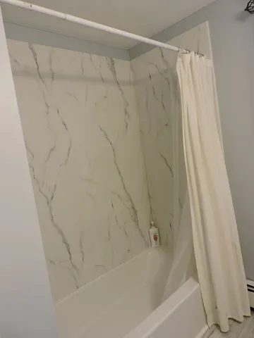a bathroom with a bathtub