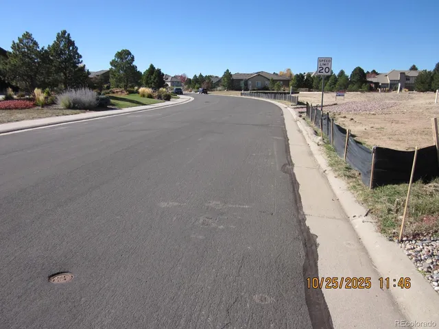 a terrace with outdoor seating and ocean view