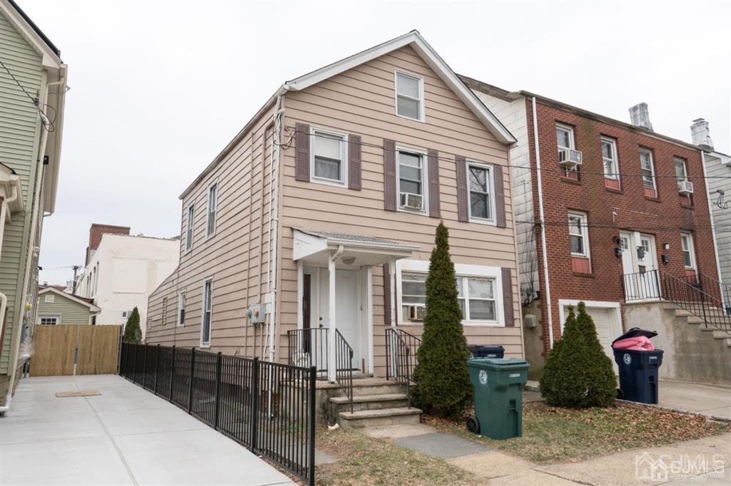 77 Center Street Perth Amboy, NJ 08861 - Photo 1 of 28 a view of a house
