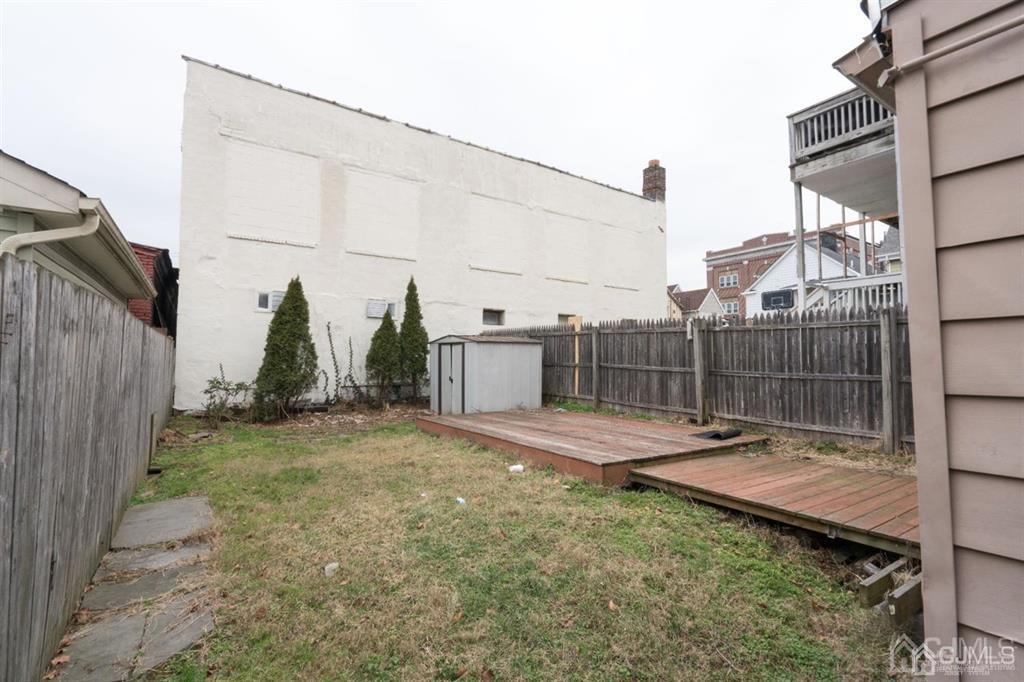 77 Center Street Perth Amboy, NJ 08861 - Photo 6 of 28 a view of a backyard