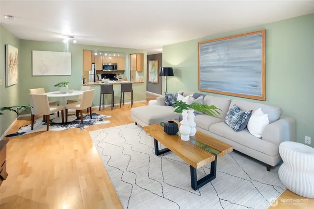 a living room with furniture and a table