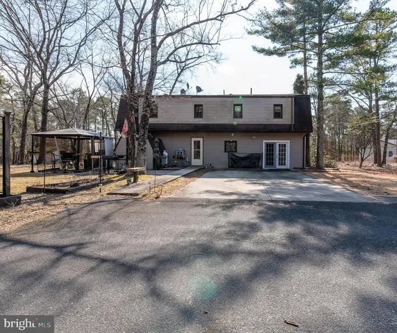 a view of a building with trees