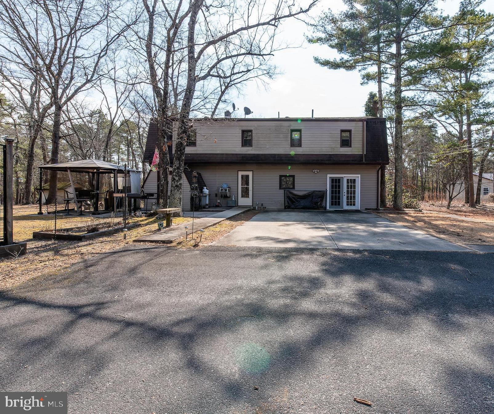 220 Chatsworth Tuckerton Road Chatsworth, NJ 08019 - Photo 2 of 64 a view of a building with trees