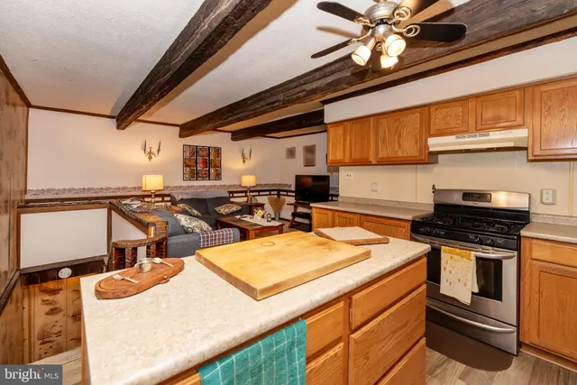 a view of a workspace with furniture