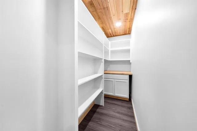 a view of an entryway with wooden floor