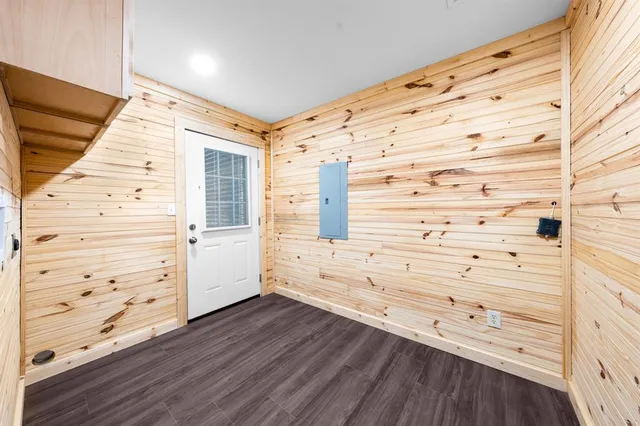 a view of walk in closet and bedroom