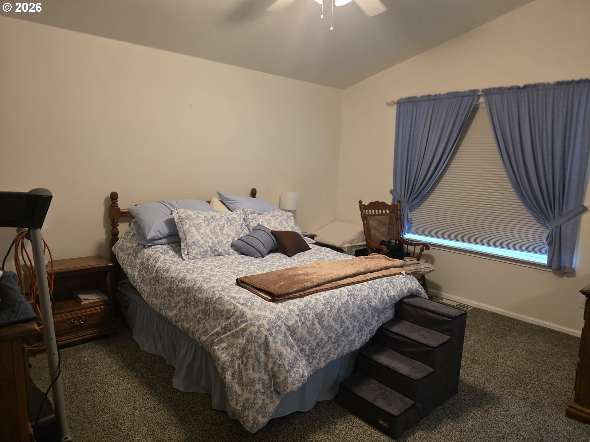 1909 Southwest Duke Road Sutherlin, OR 97479 - Photo 17 of 30 a bedroom with double bed and a window