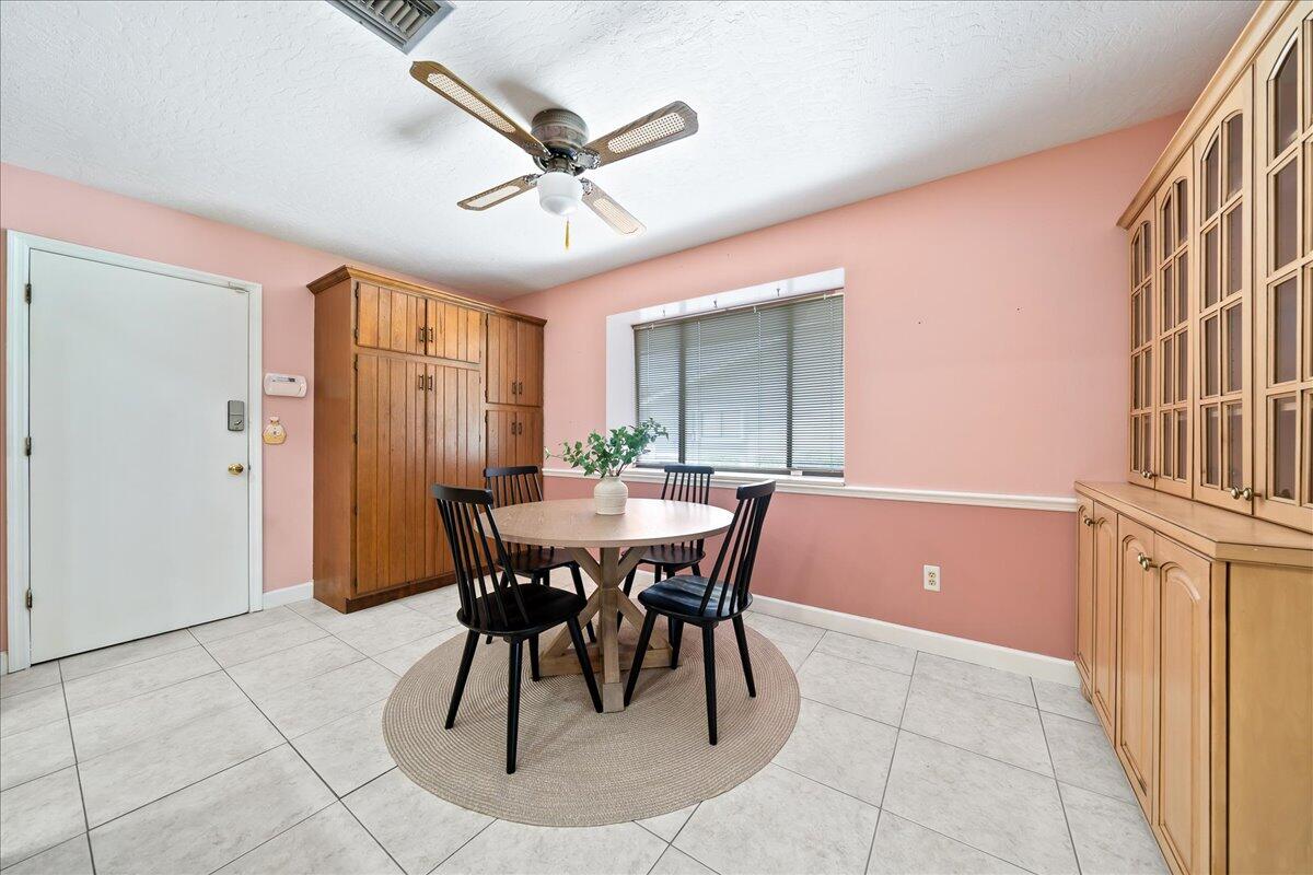 271 Sandy Run Melbourne, FL 32940 - Photo 16 of 41 a view of a dining room with furniture