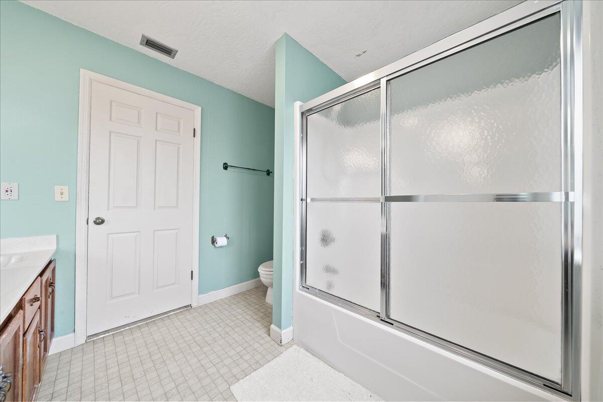 271 Sandy Run Melbourne, FL 32940 - Photo 29 of 41 a bathroom with a shower and a sink