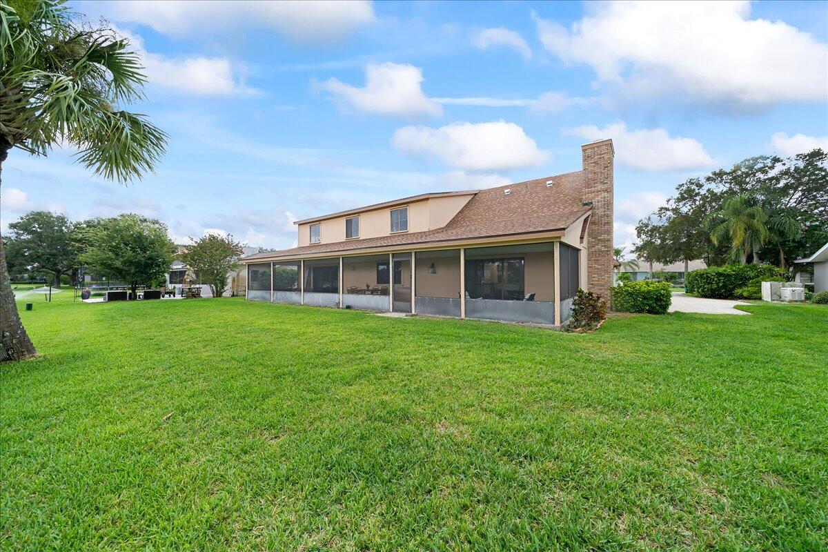 271 Sandy Run Melbourne, FL 32940 - Photo 34 of 41 a front view of house with yard and green space