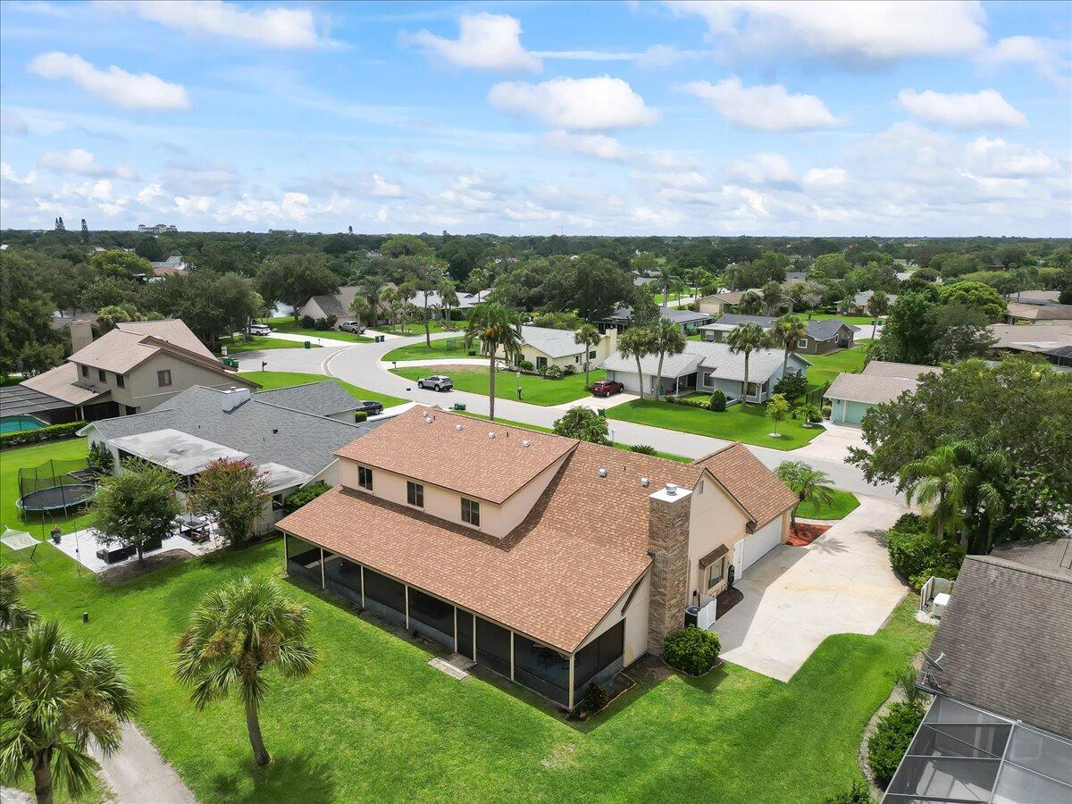 271 Sandy Run Melbourne, FL 32940 - Photo 38 of 41 an aerial view of a house with garden space ocean and mountain view in back