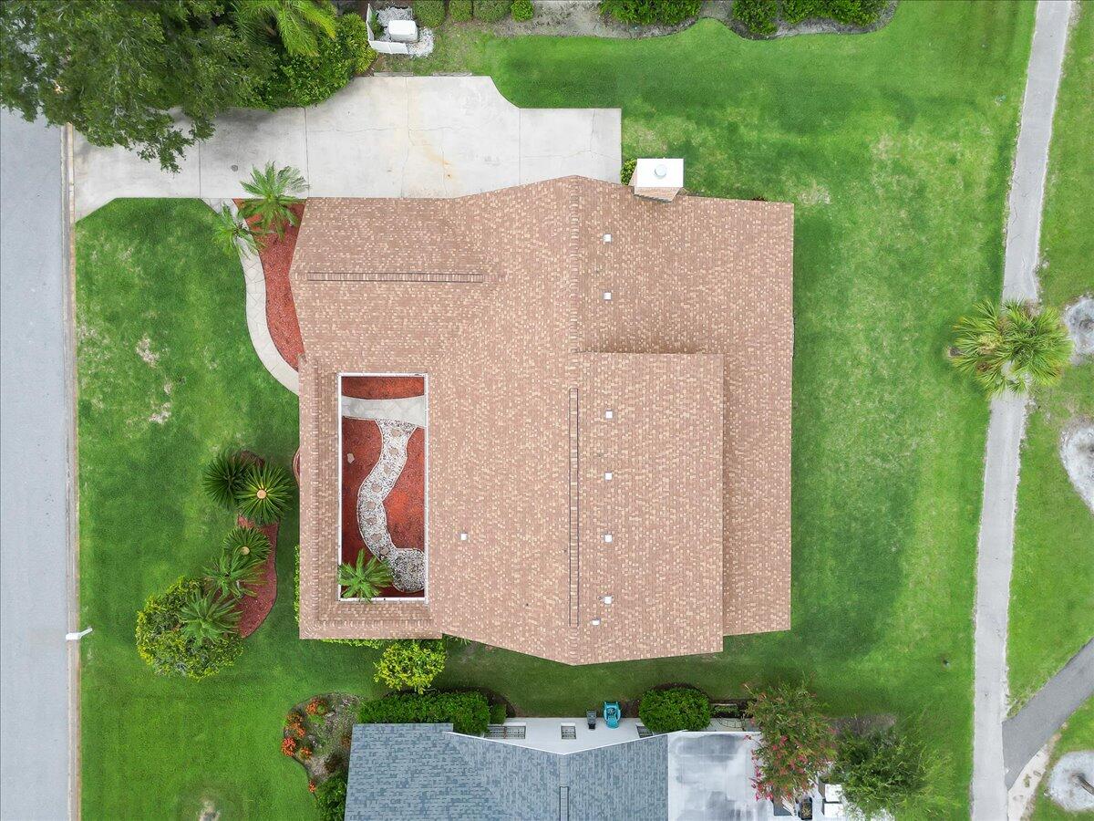 271 Sandy Run Melbourne, FL 32940 - Photo 39 of 41 an aerial view of a house with garden space and street view
