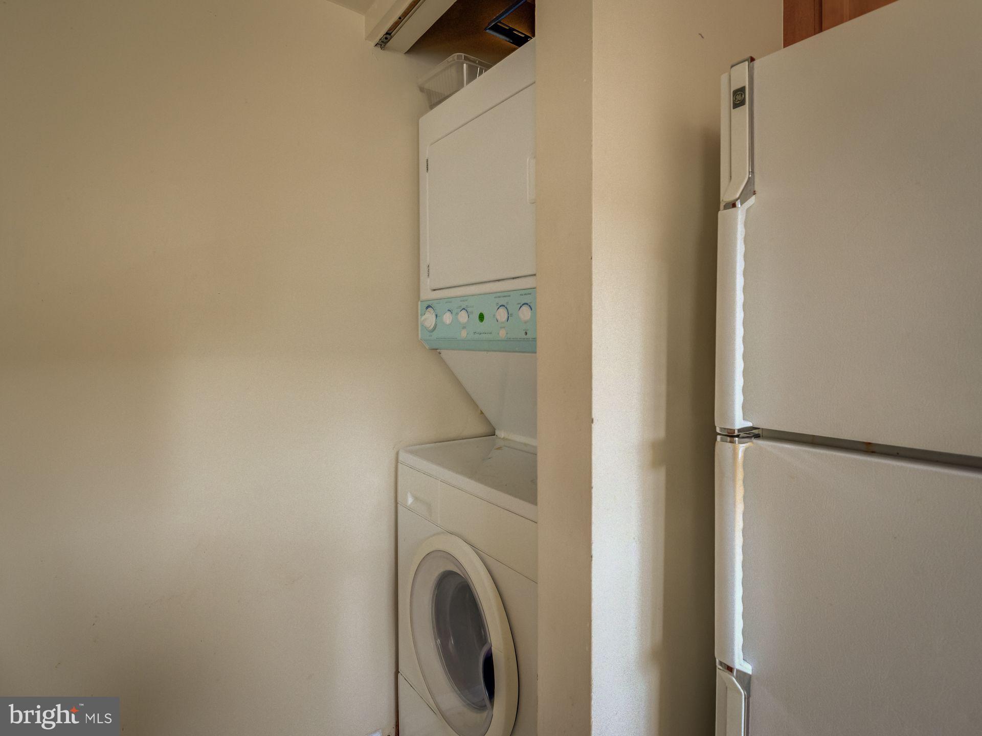 14059 Vista Drive, Unit 141 Laurel, MD 20707 - Photo 19 of 33 a utility room with dryer and washer