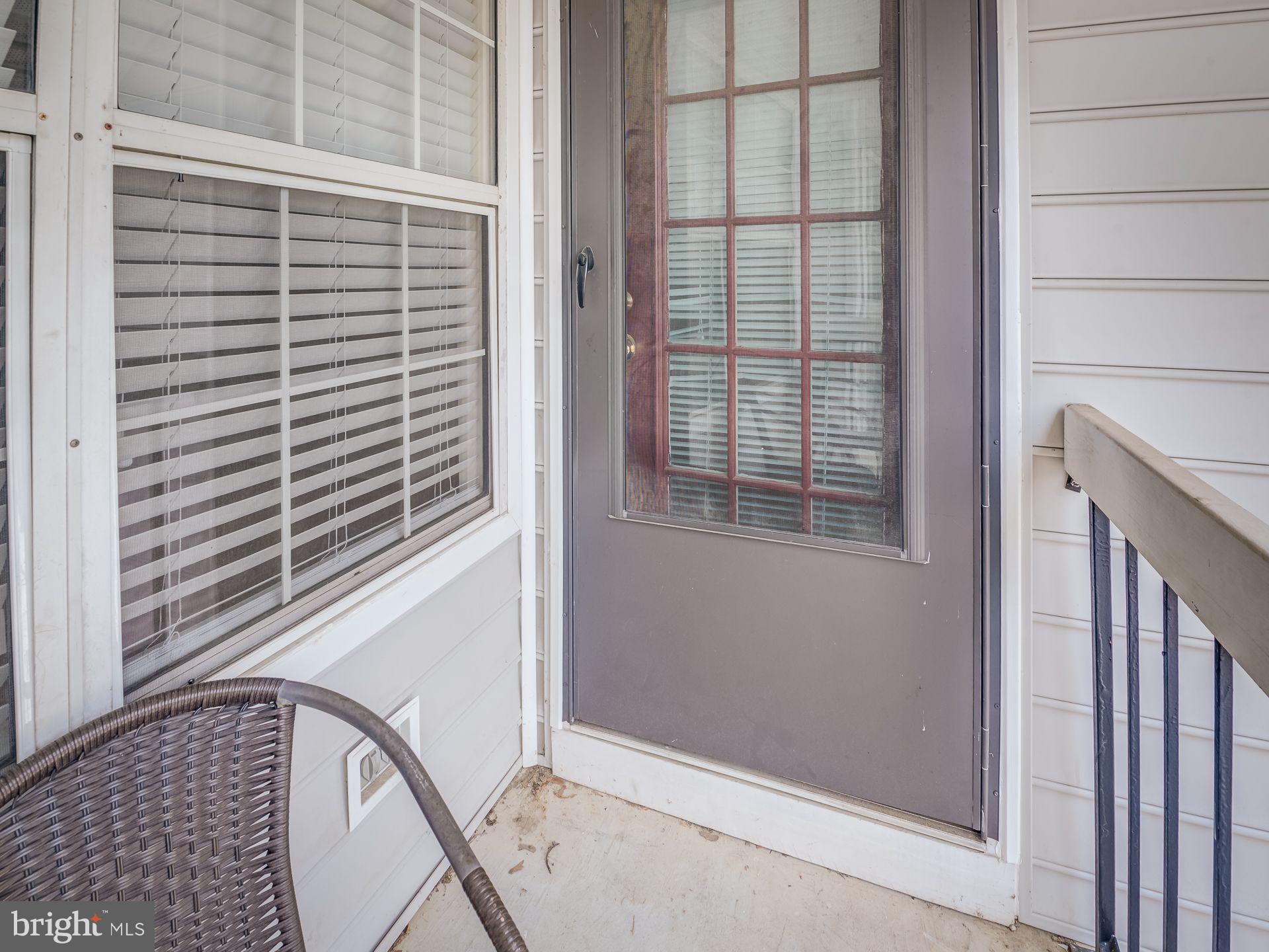 14059 Vista Drive, Unit 141 Laurel, MD 20707 - Photo 33 of 33 a view of a balcony and door