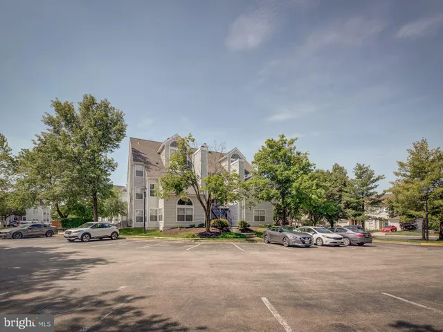 a view of a road with a building in the background