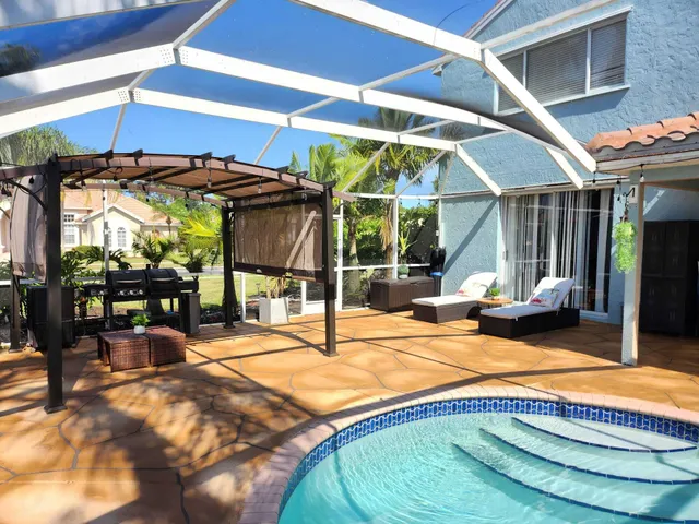 $695,000 | 609 Southwest Romora Bay, Port St. Lucie, FL 34986