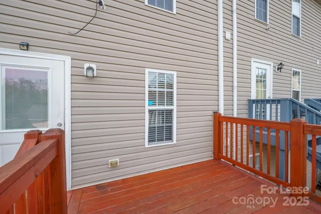 a view of backyard with deck