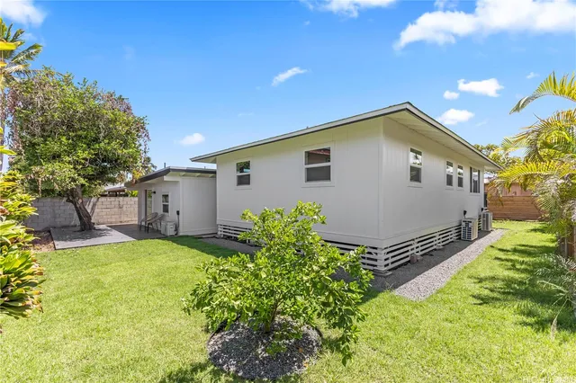 a house view with a garden space