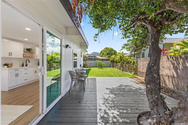 a view of a swimming pool with a patio