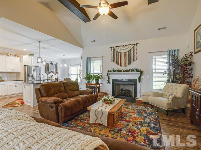 40 Fisher Road Lillington, NC 27546 - Photo 14 of 47 a living room with furniture and a fireplace