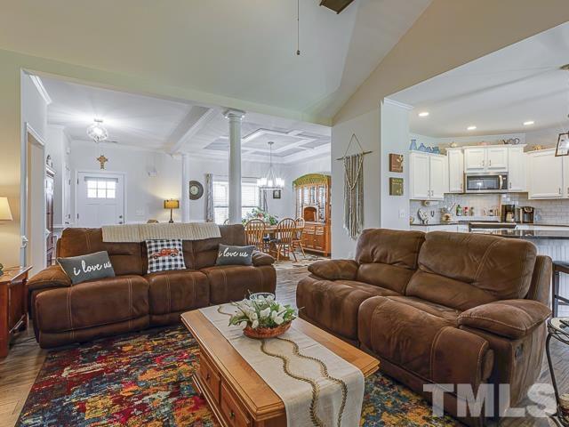 40 Fisher Road Lillington, NC 27546 - Photo 18 of 47 a living room with furniture and a large window
