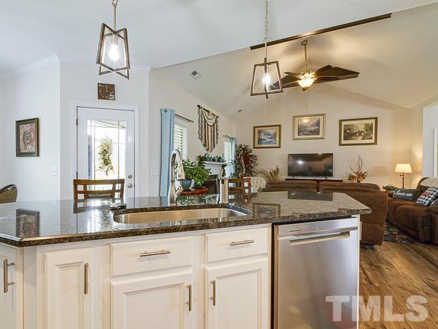 40 Fisher Road Lillington, NC 27546 - Photo 23 of 47 a kitchen with cabinets a sink and appliances