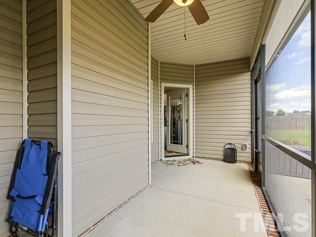 40 Fisher Road Lillington, NC 27546 - Photo 29 of 47 a view of a porch with a door and a door