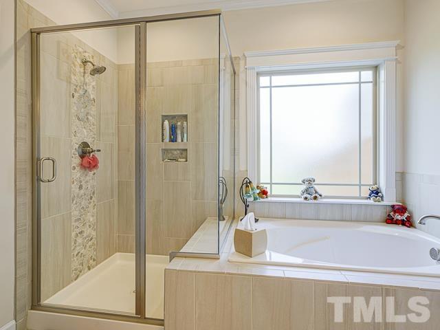 40 Fisher Road Lillington, NC 27546 - Photo 33 of 47 a bathroom with a sink and a mirror