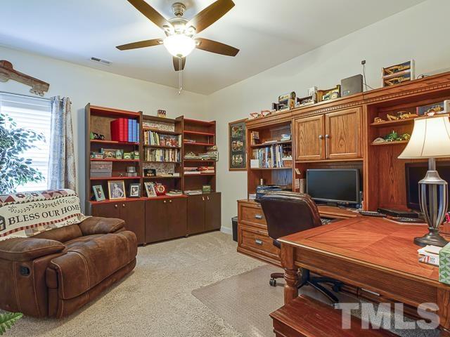40 Fisher Road Lillington, NC 27546 - Photo 38 of 47 a room with furniture workspace and a window