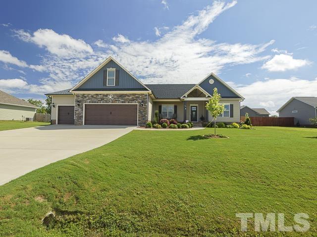40 Fisher Road Lillington, NC 27546 - Photo 4 of 47 a view of house with garden