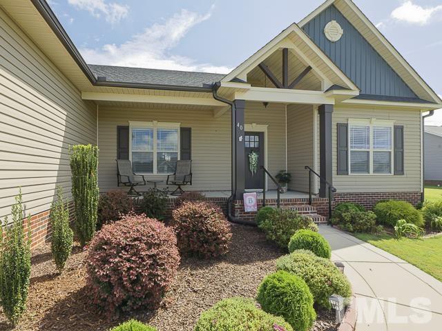 40 Fisher Road Lillington, NC 27546 - Photo 6 of 47 a front view of a house with garden