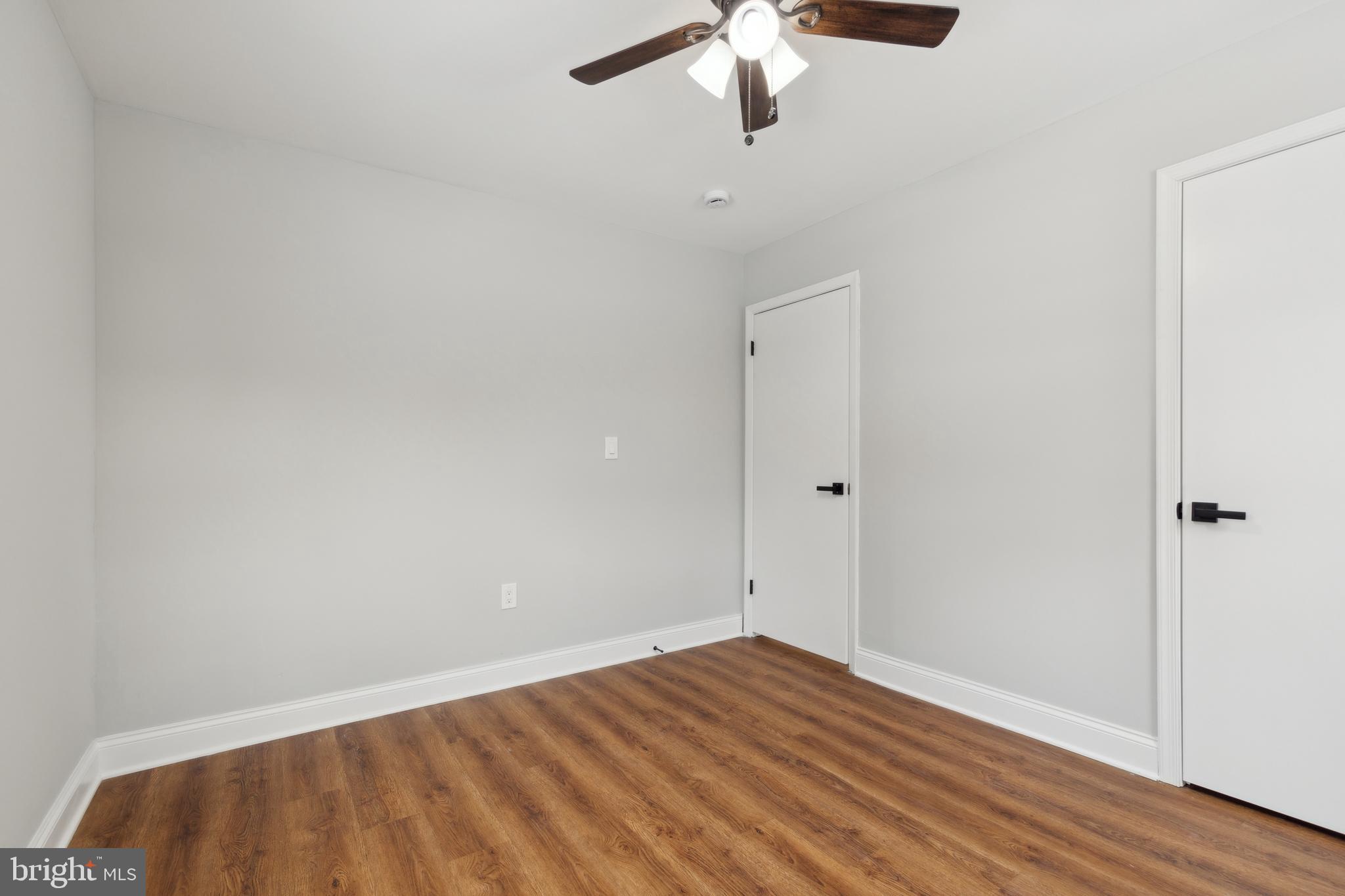 7760 Telegraph Road Severn, MD 21144 - Photo 30 of 49 wooden floor in an empty room