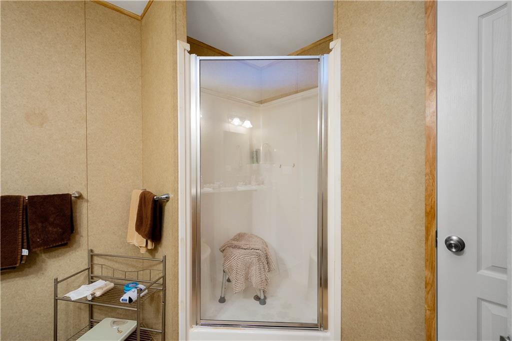 534 Finks Run Road McDonald, PA 15057 - Photo 25 of 35 a bathroom with a tub shower and mirror
