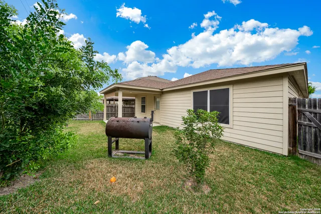 a house view with a garden space